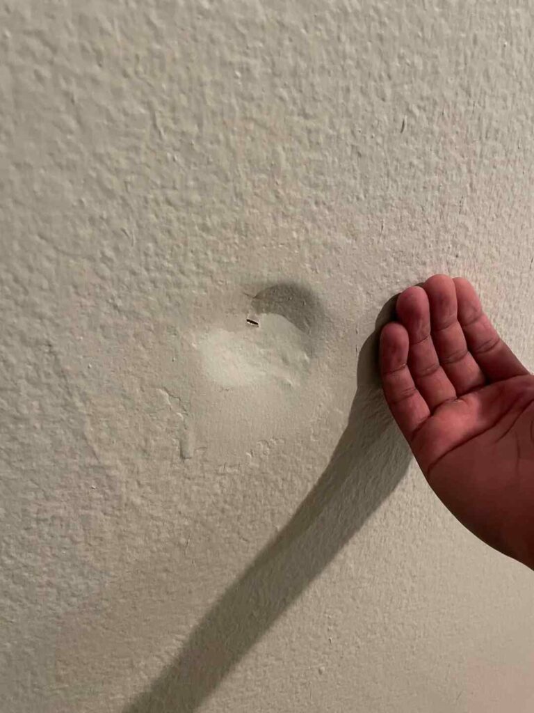 how to fix a dent in the wall